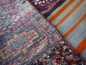 Preview: Bachtiari Soumak Sattel Teppich alt 118 x 102 cm handgeknüpft, handgewebt und handbestickt.