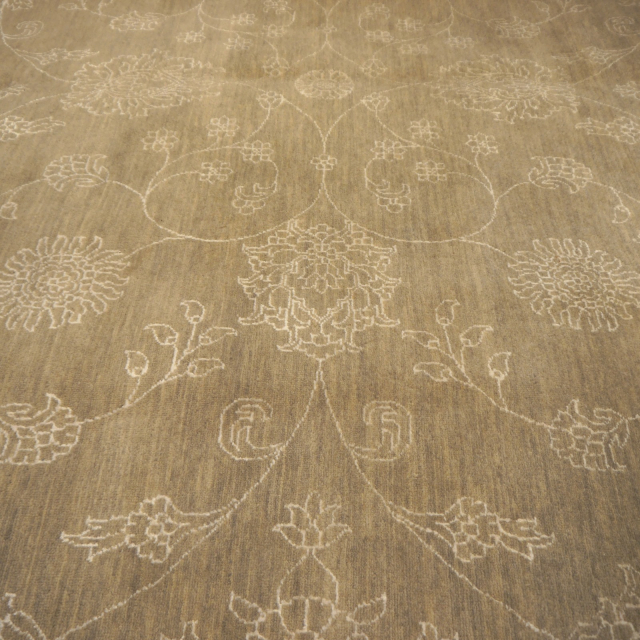 This original hand-knotted Agra Style Rug measures 9 x 12 ft and goes well with interior design styles. The pale and faded color gives it a cool look. 15653