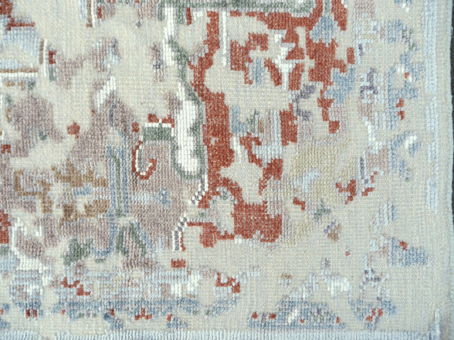 Shop a luxurious Heriz living room rug, hand-knotted in India. Beige & blue tones, 360 x 280 cm, made from wool & viscose. Perfect for your home!