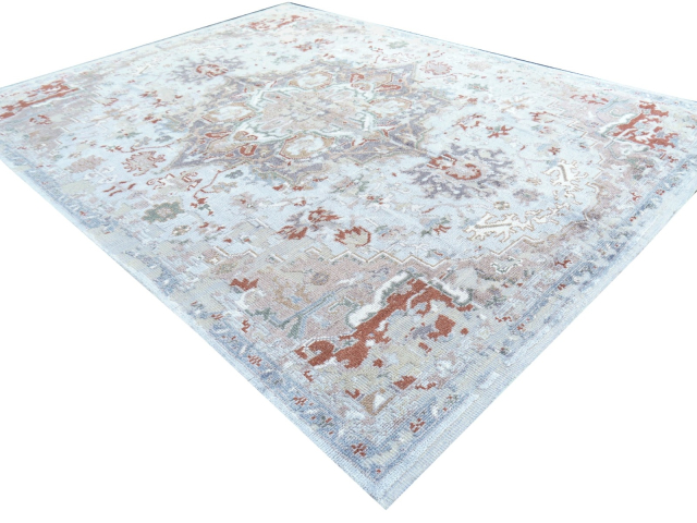 Shop a luxurious Heriz living room rug, hand-knotted in India. Beige & blue tones, 360 x 280 cm, made from wool & viscose. Perfect for your home!